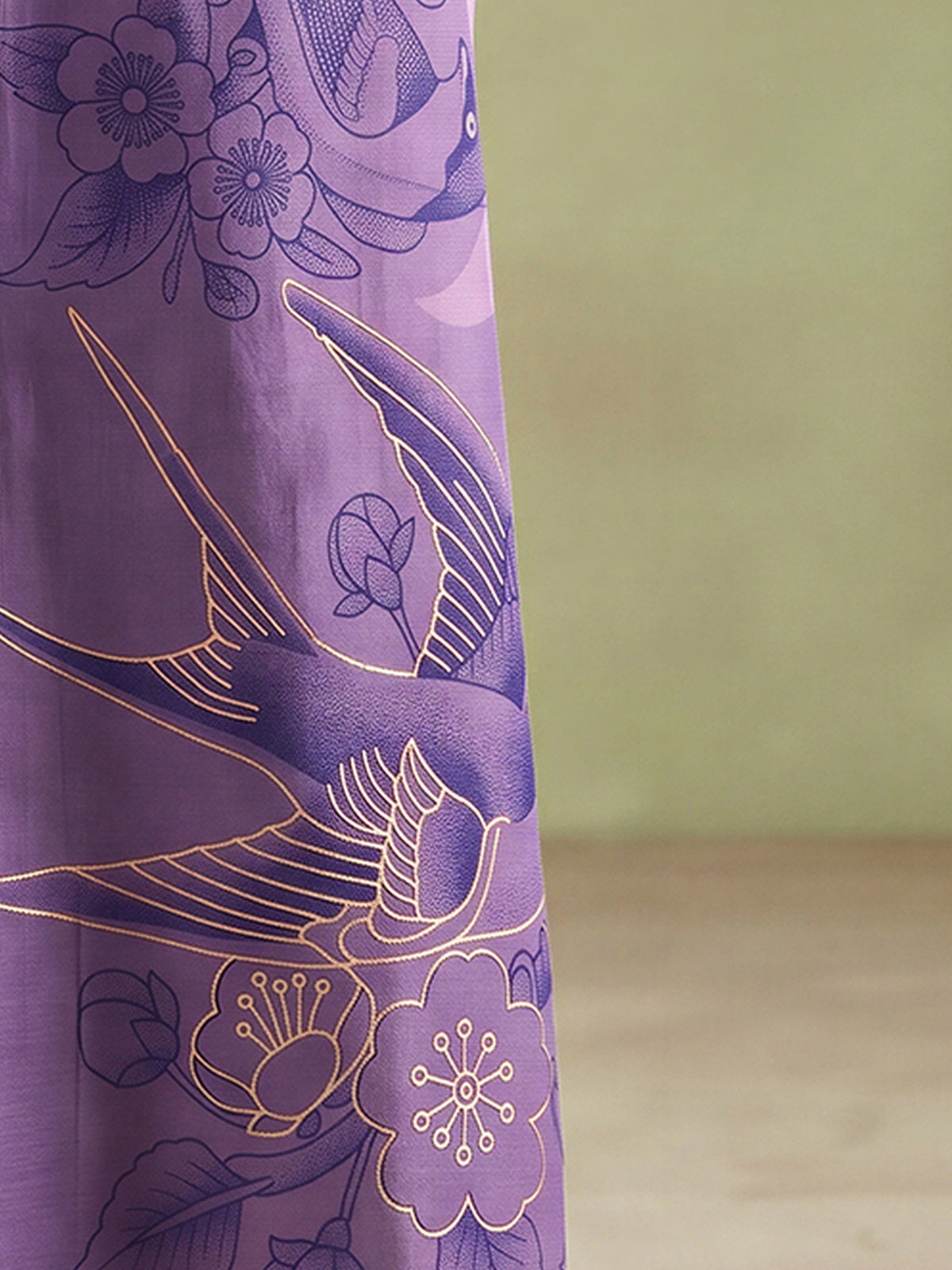 Pallu detail of lavender silk blend saree showing traditional indian motif work and woven design border