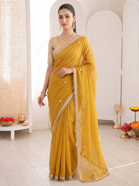 Yellow embellished poly georgette saree with gold blouse piece