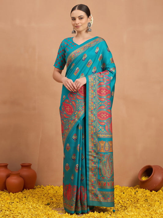 Woman wearing light blue silk blend saree with metallic foil print work and light blue blouse