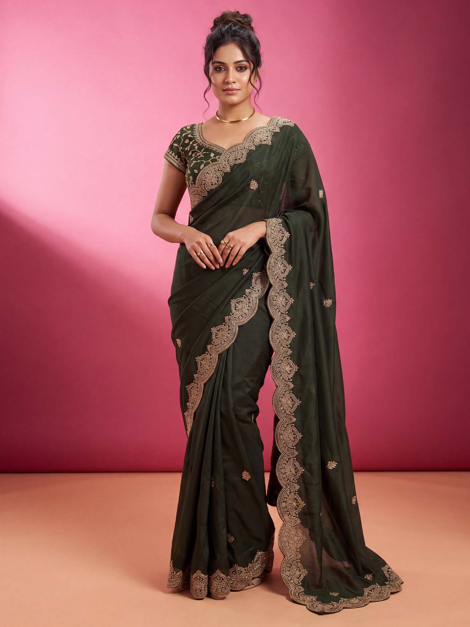 Woman wearing olive georgette saree with embroidered motif work and olive blouse