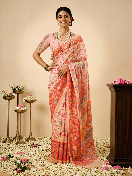 Woman wearing peach cotton silk saree with all-over floral design and peach blouse