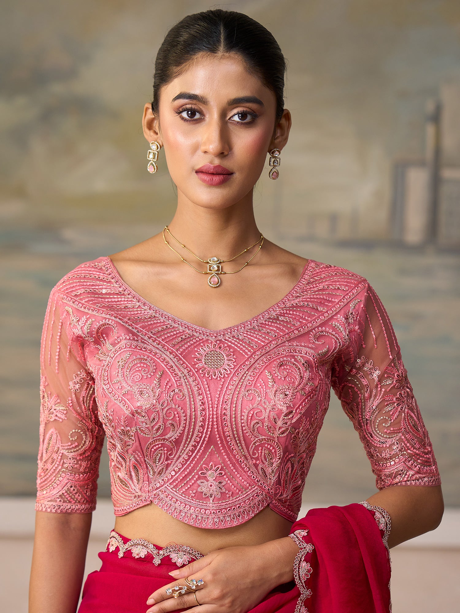 Unstitched peach tussar silk blouse piece with embellished design