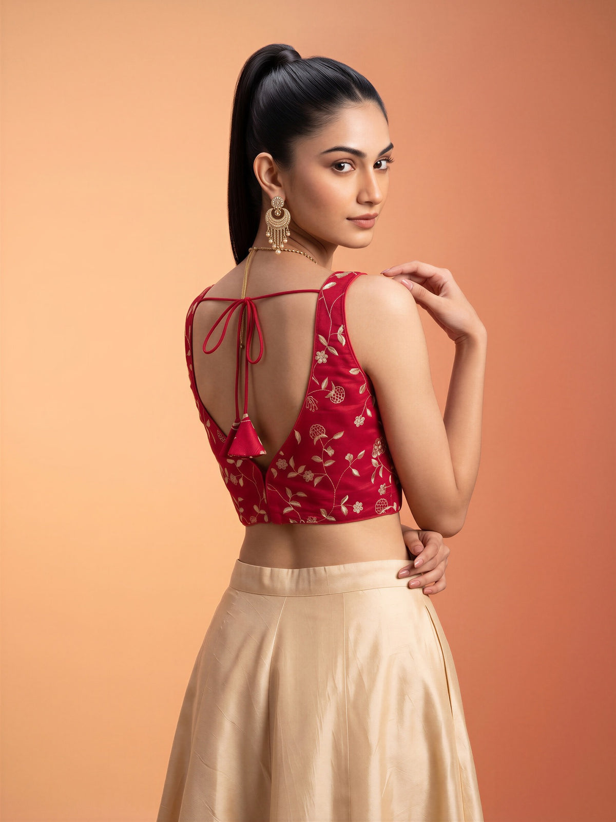 Red sequin embellished silk blend sleeveless readymade saree blouse with v neck view 1