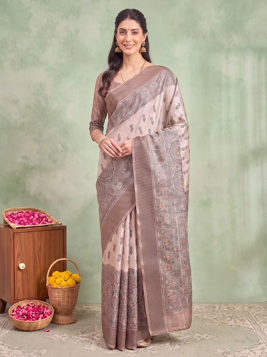 Woman wearing beige manipuri silk saree with madhubani folk-art motifs and beige blouse