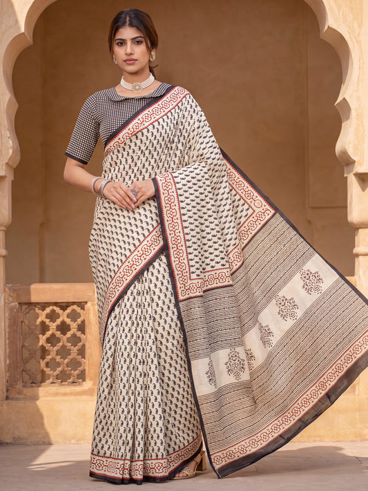 Woman wearing off white bhagalpuri silk saree with bagh block-print motif work and black blouse