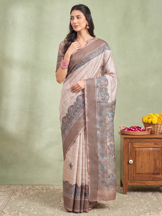 Woman wearing beige manipuri silk saree with madhubani folk-art motifs and beige blouse