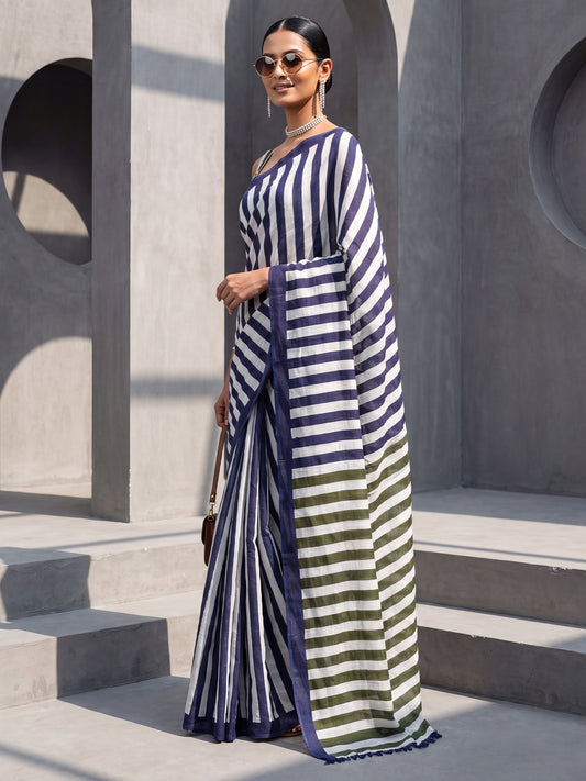 Woman wearing navy blue cotton saree with striped pattern design and green blouse
