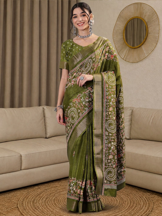 Woman wearing olive silk blend saree with tribal folk-art motifs and olive blouse