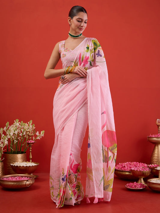 Woman wearing pink linen ready to wear saree with all-over floral design and pink blouse
