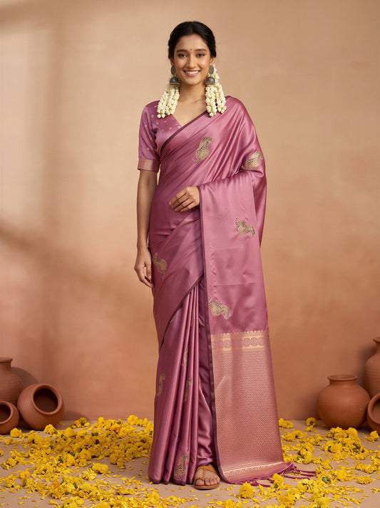 Woman wearing mauve satin silk saree with animal-print design and mauve blouse