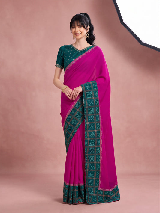 Woman wearing magenta vichitra silk saree with bandhani tie-dye dot work and teal blue blouse