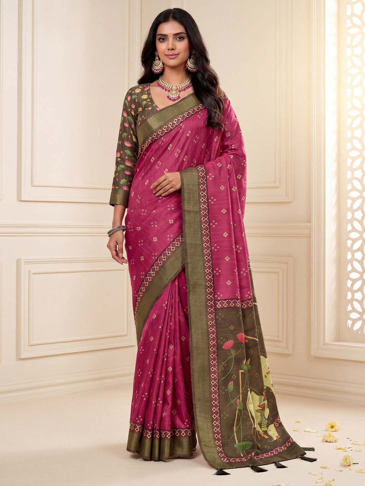 Woman wearing pink silk blend saree with madhubani folk-art motifs and green blouse
