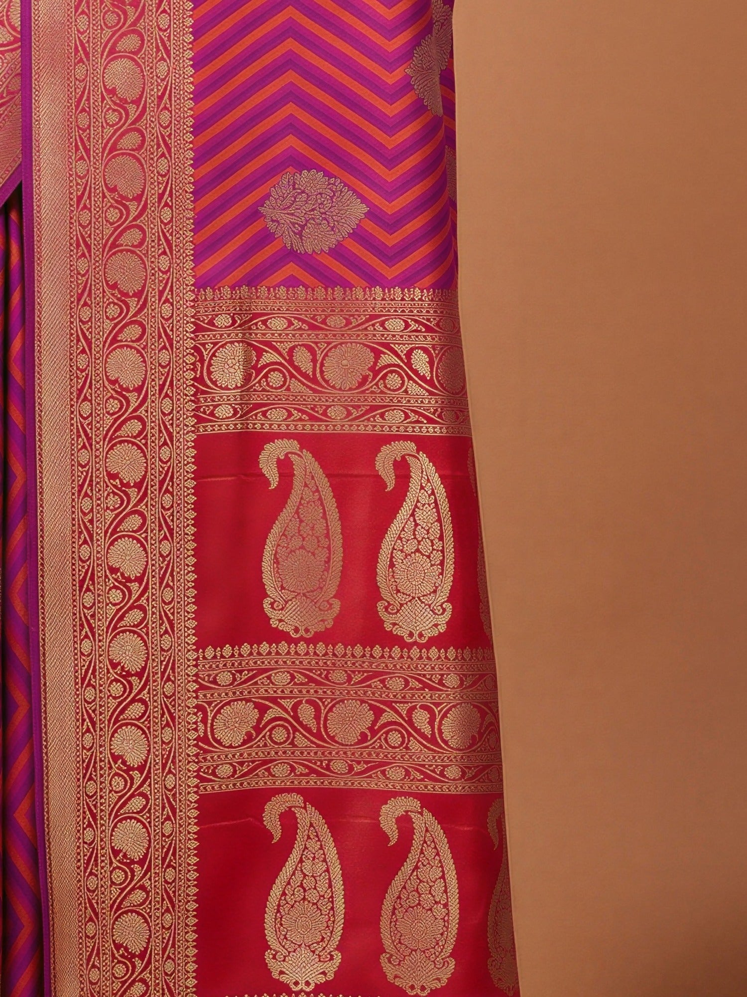 Pallu detail of purple silk blend saree showing geometric pattern design and zari border