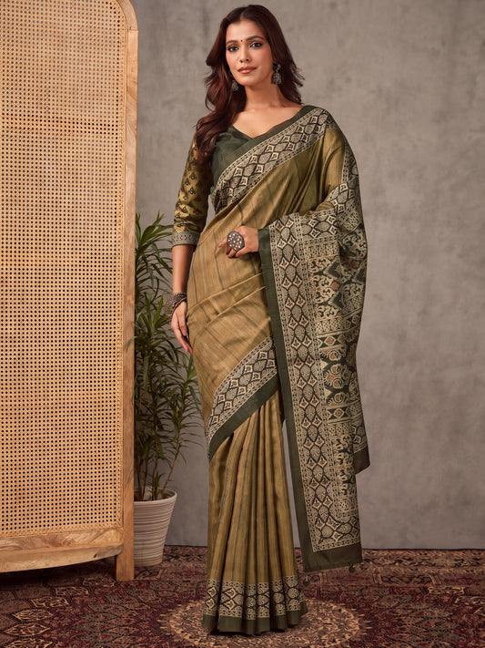 Woman wearing light green silk blend saree with striped pattern design and light green blouse