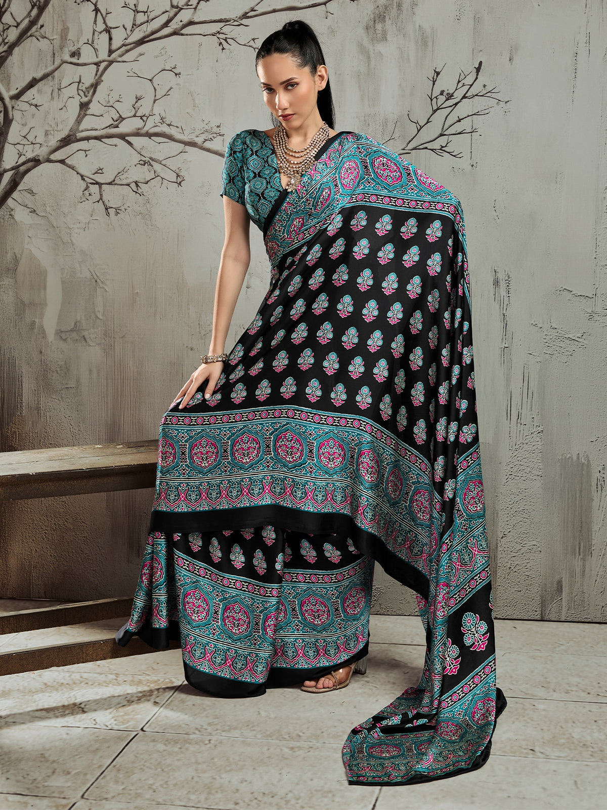 Black ajrak satin saree with turquoise blue blouse piece