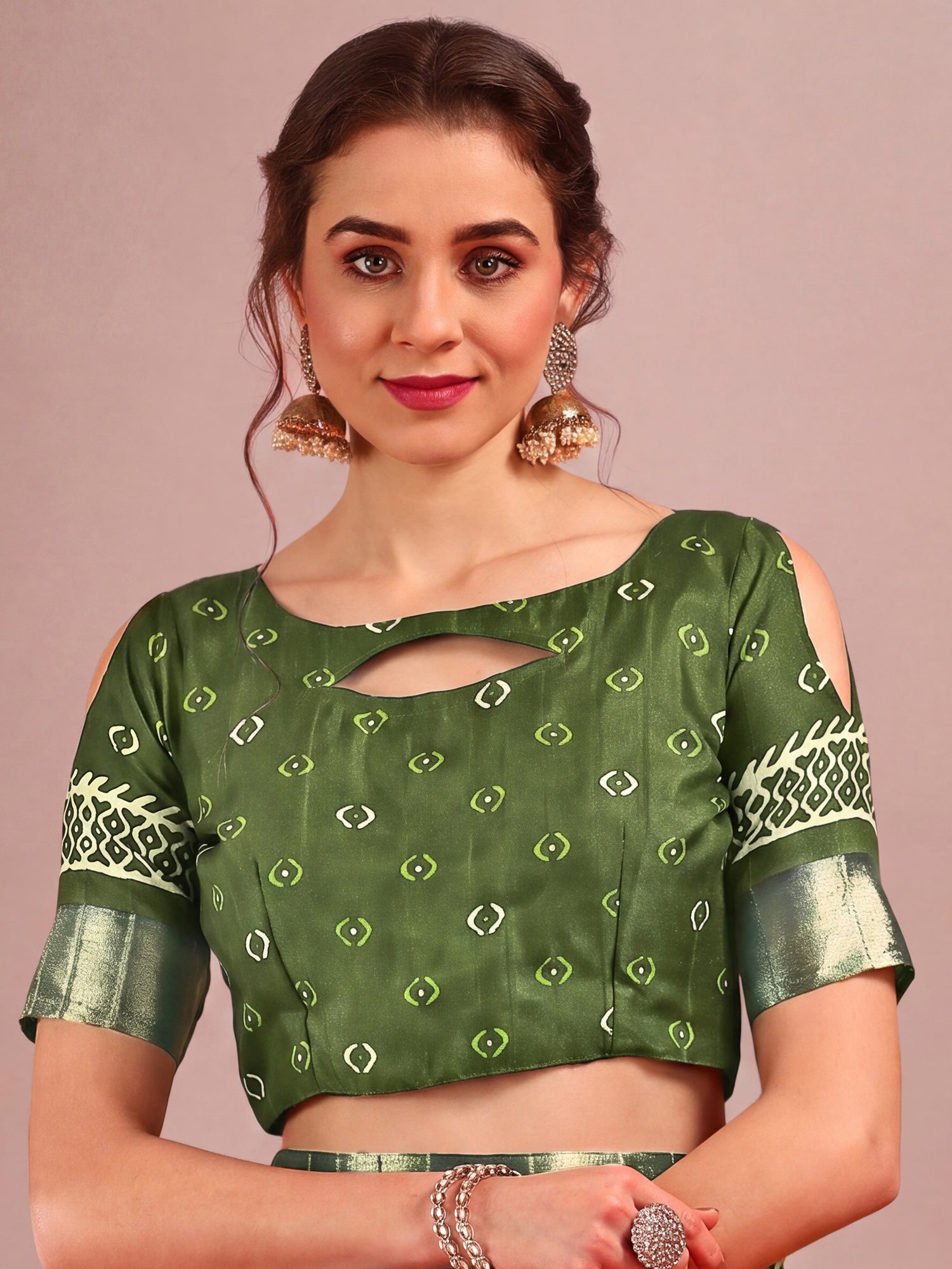Unstitched green cotton silk blouse piece with ethnic motif design