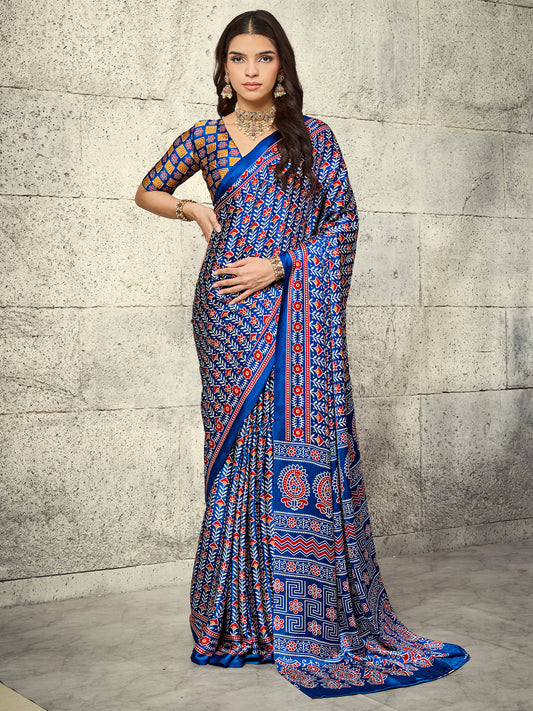 Woman wearing blue satin saree with ajrak block-print motif work and blue blouse