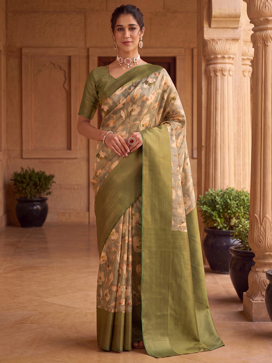 Woman wearing light green silk blend saree with all-over floral design and olive blouse