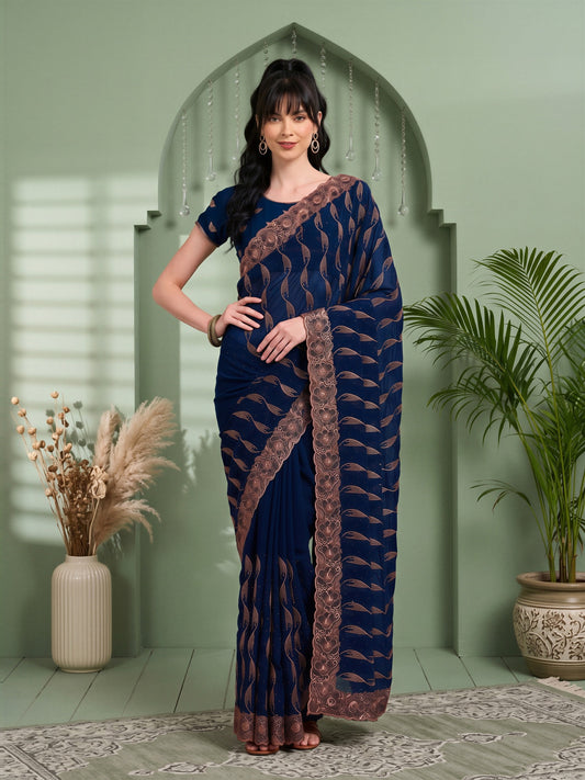 Woman wearing teal blue pure georgette saree with geometric pattern design and teal blue blouse