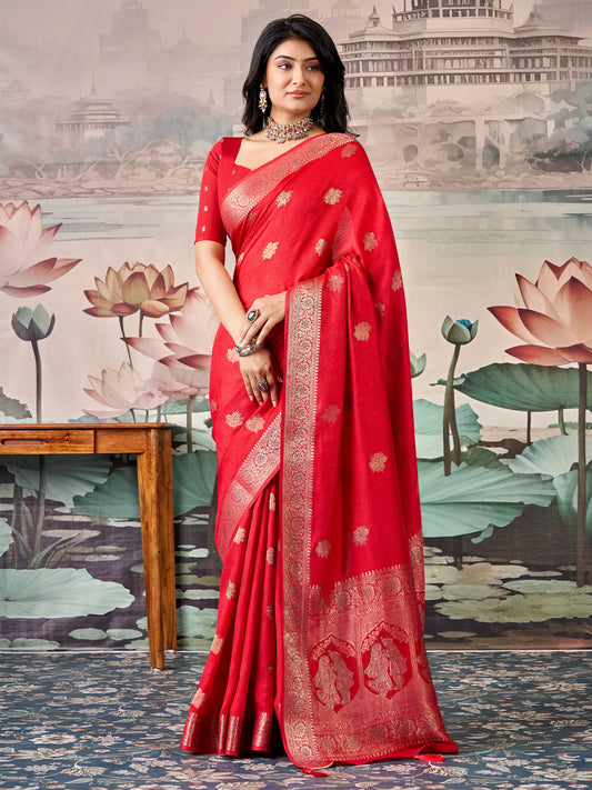 Woman wearing red georgette saree with zari butta (metallic motif) work and red blouse