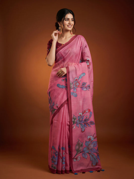 Woman wearing pink linen blend saree with all-over floral design and magenta blouse