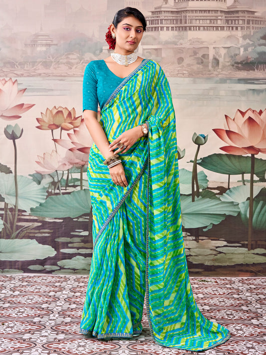 Woman wearing multicolored georgette saree with leheriya design and teal blue blouse