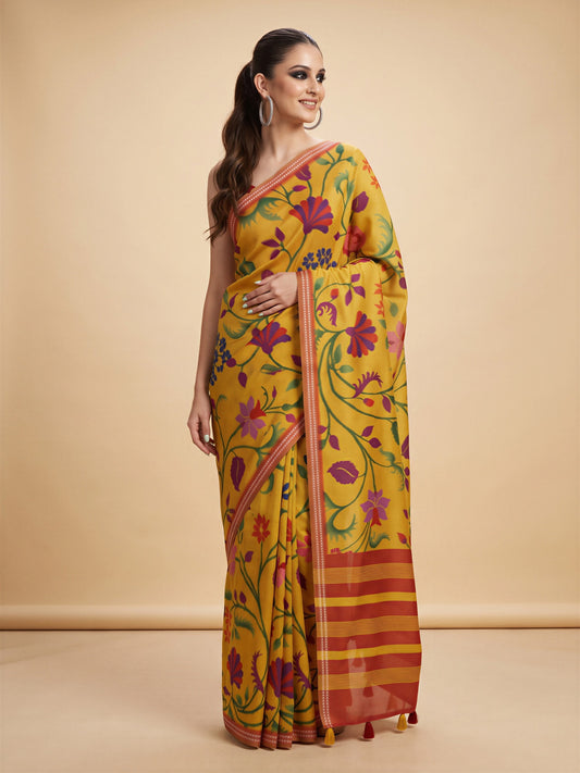 Woman wearing mustard tussar silk saree with ikat resist-dyed pattern and orange blouse
