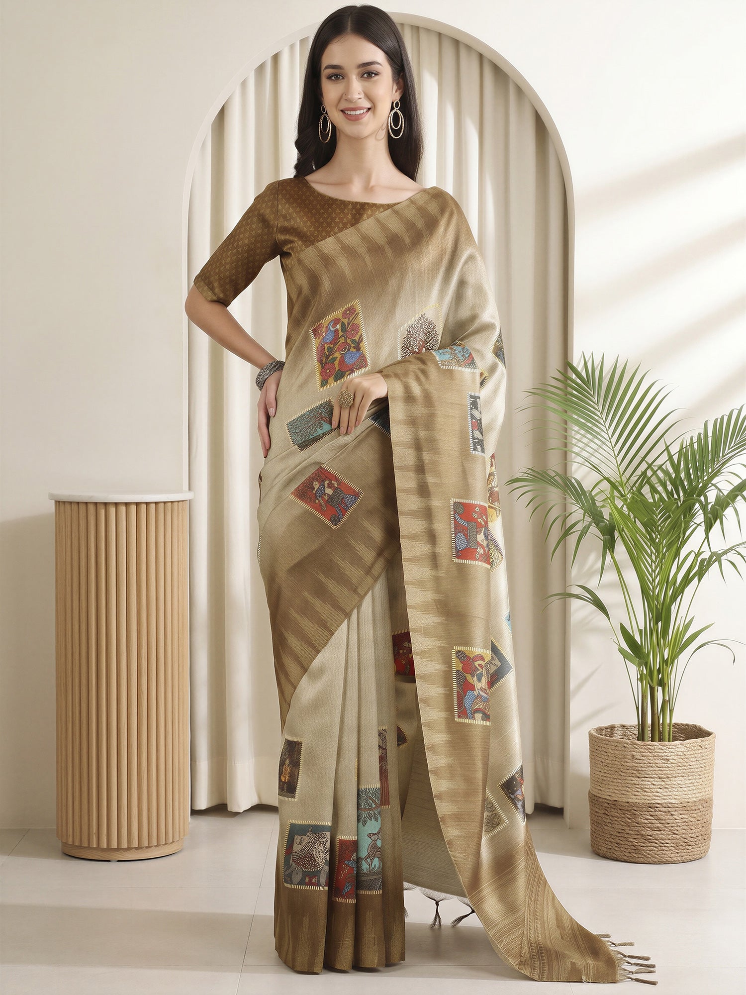 Woman wearing olive cotton silk saree with traditional indian motif work and olive blouse