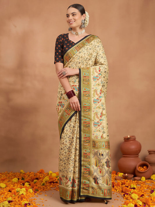 Woman wearing cream silk blend saree with metallic foil print work and black blouse