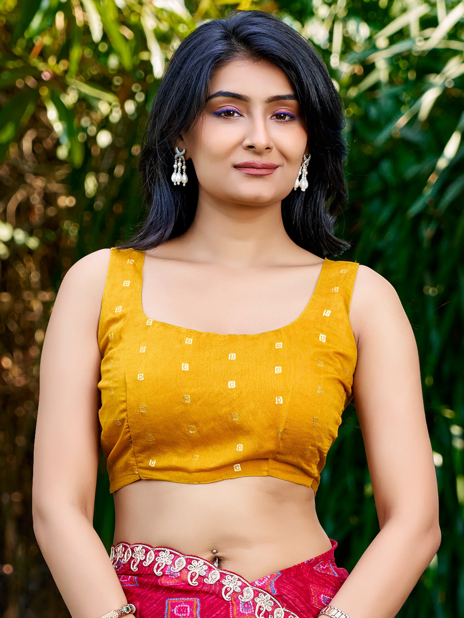 Unstitched yellow georgette blouse piece with zari butta design