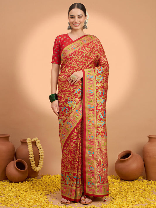 Woman wearing red silk blend saree with metallic foil print work and red blouse