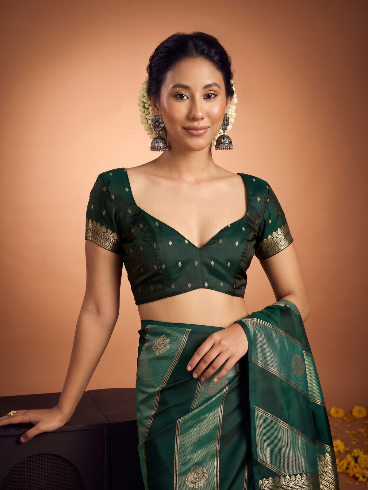 Unstitched green satin blouse piece with zari butta design