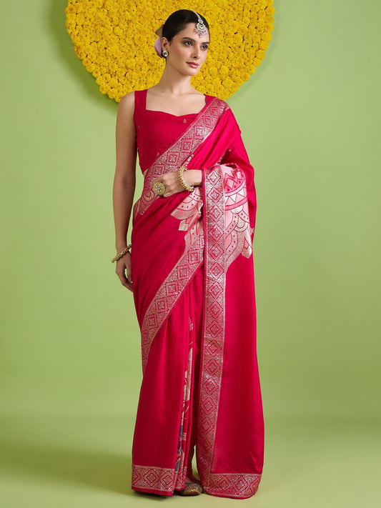 Woman wearing pink silk blend saree with woven motif design and pink blouse