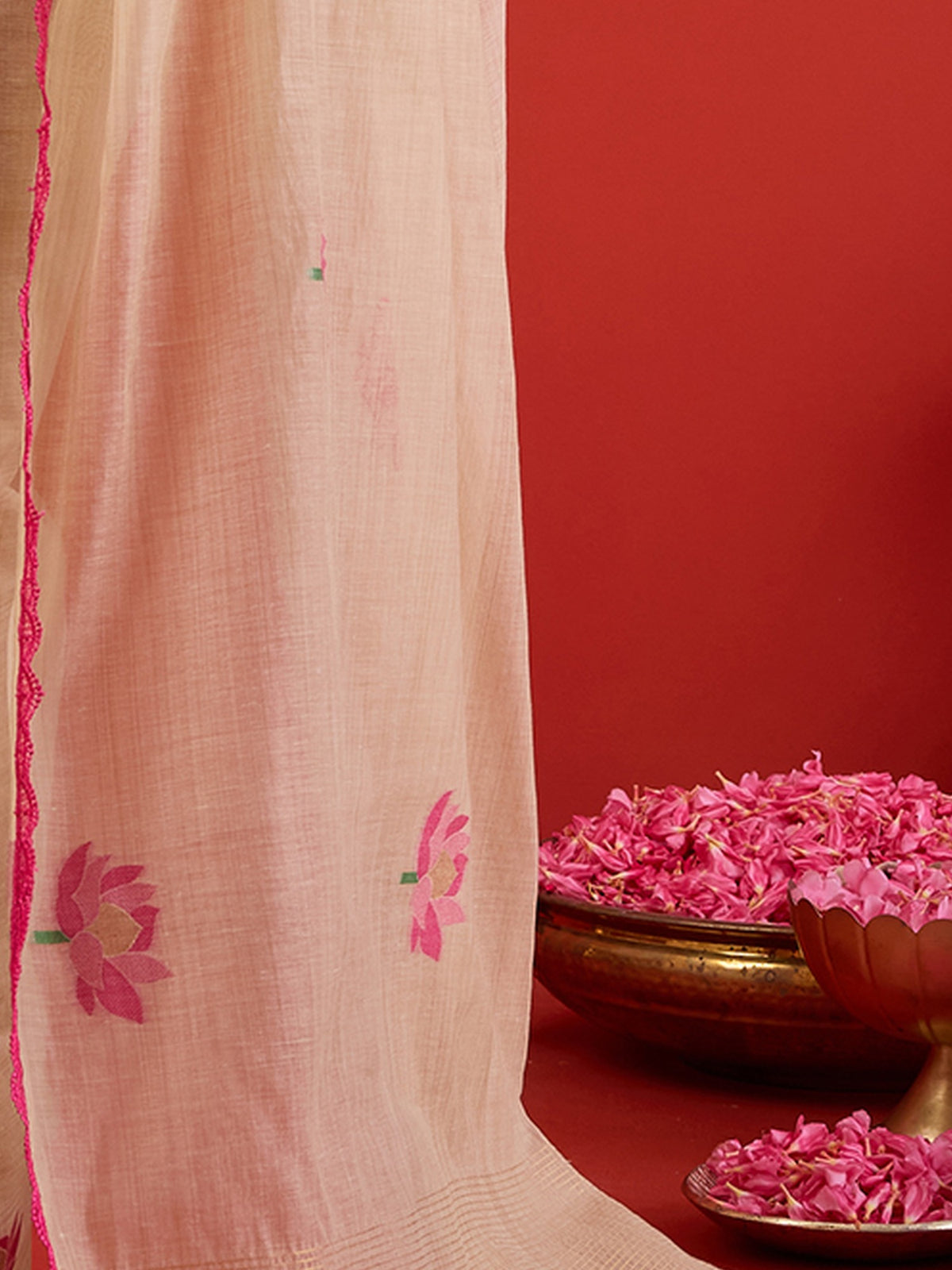 Pallu detail of off white chanderi cotton saree showing all-over floral design and embroidered border