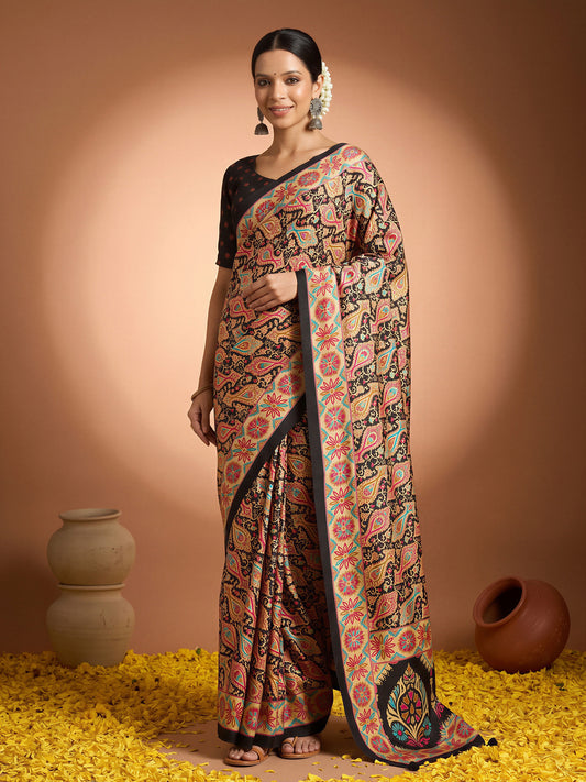 Woman wearing assorted silk blend saree with metallic foil print work and black blouse