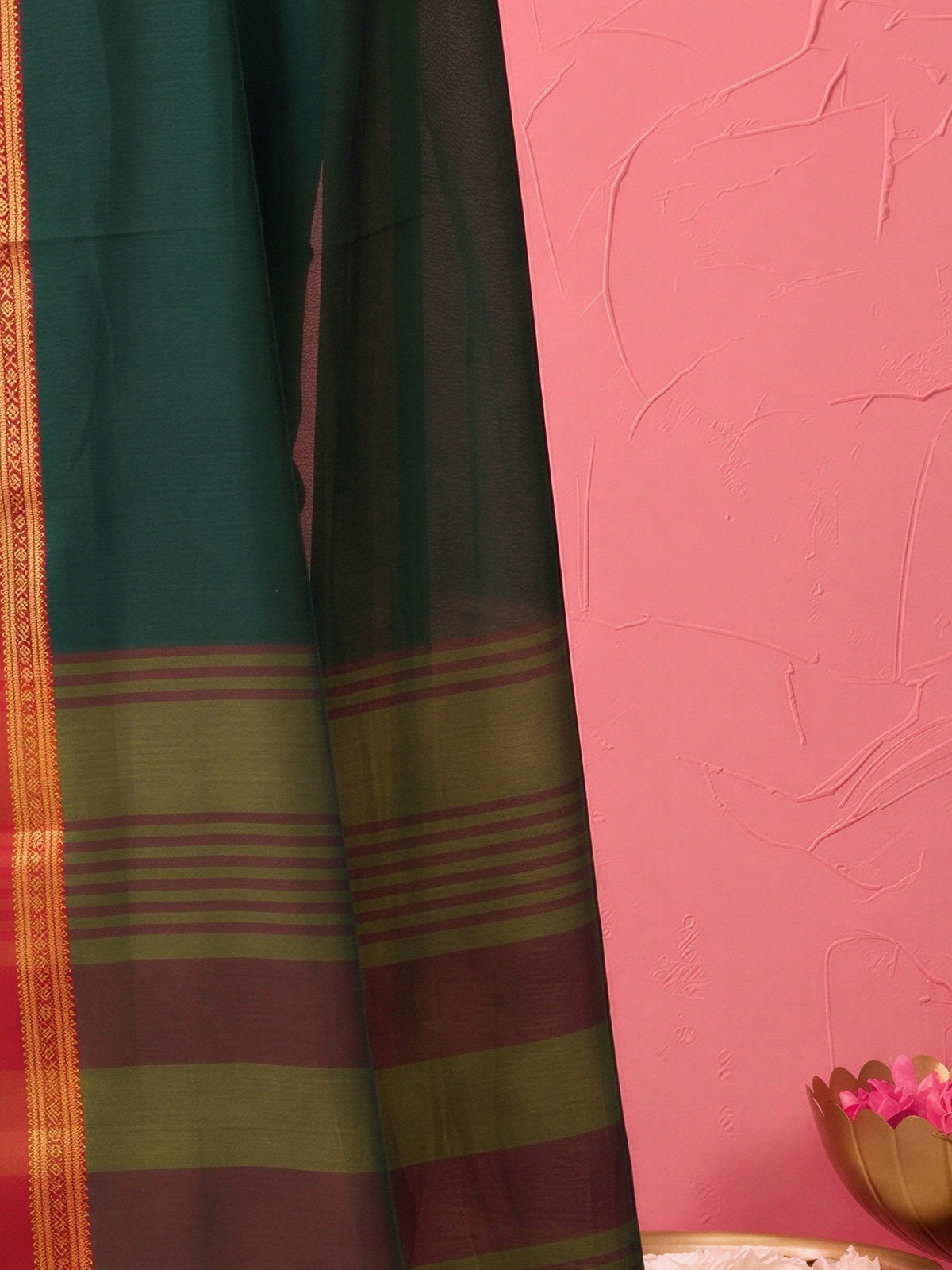Pallu detail of dark brown cotton blend saree showing clean solid-tone finish and zari border