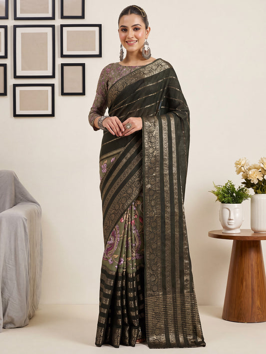 Woman wearing green viscose silk saree with traditional indian motif work and sea green blouse