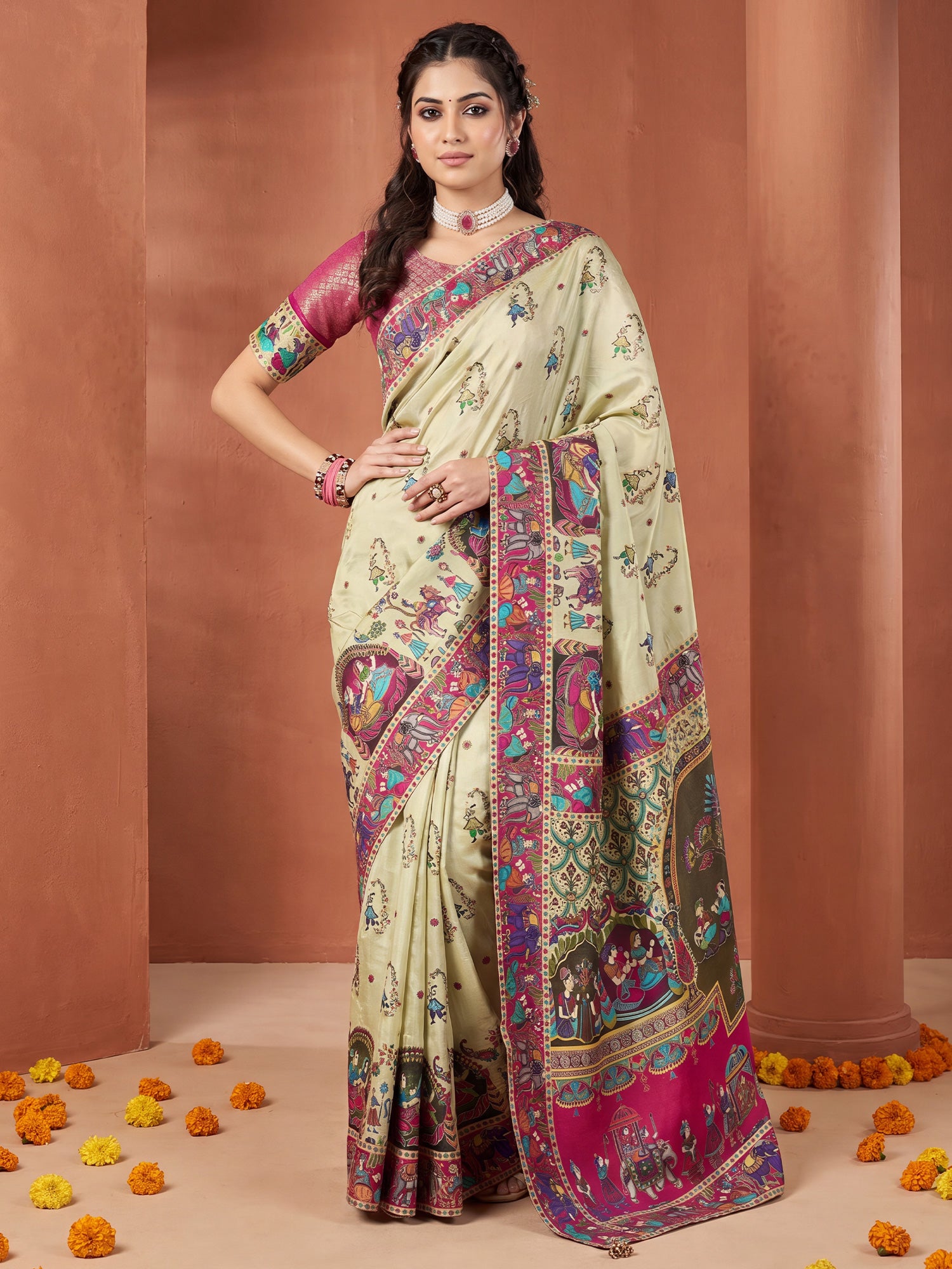 Woman wearing light green viscose silk saree with traditional indian motif work and pink blouse