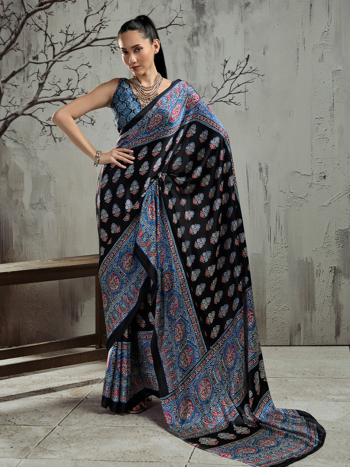 Black ajrak satin saree with light blue blouse piece