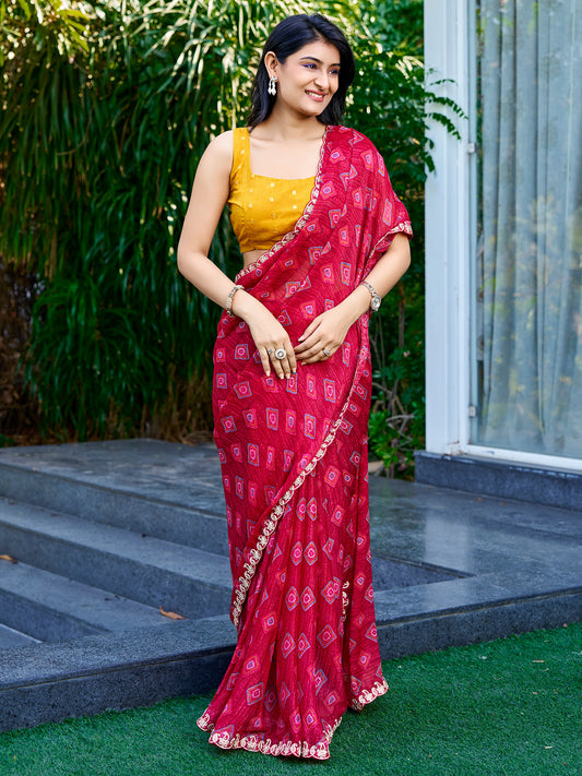 Woman wearing red georgette saree with geometric pattern design and yellow blouse