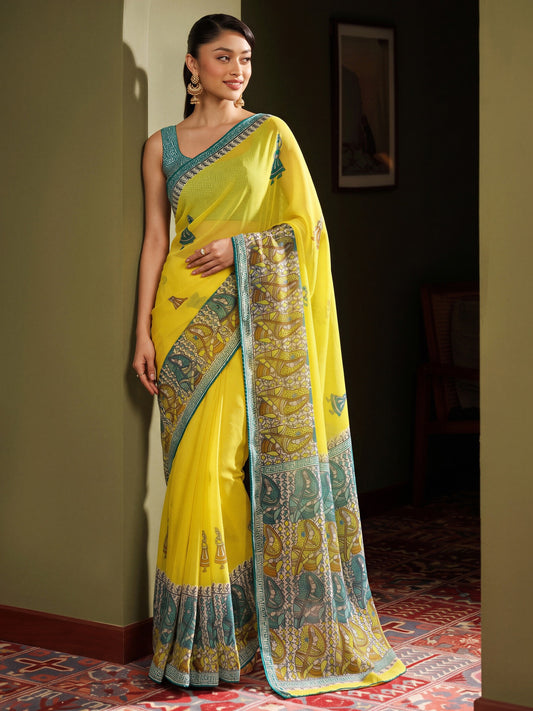 Yellow traditional prints georgette saree with light blue blouse piece