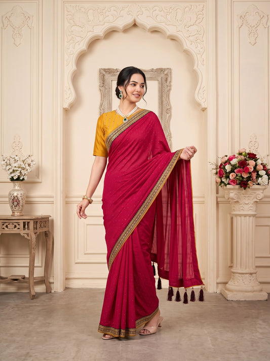 Woman wearing pink vichitra silk saree with ornamented surface design and mustard blouse