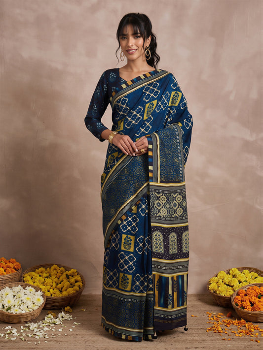 Woman wearing navy blue viscose silk saree with traditional indian motif work and navy blue blouse