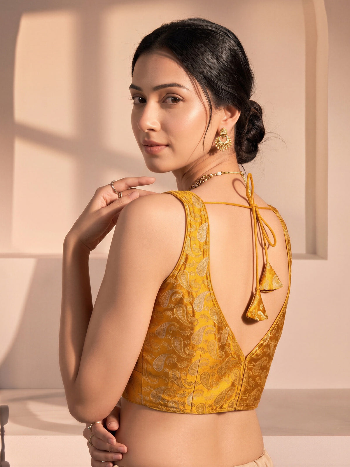 Orange woven brocade silk blend sleeveless readymade saree blouse with v neck view 1