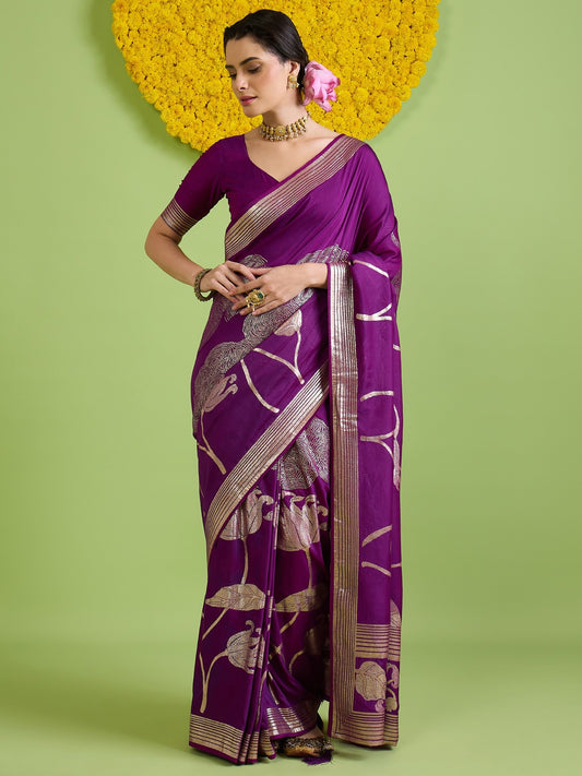 Woman wearing purple silk blend saree with all-over floral design and purple blouse