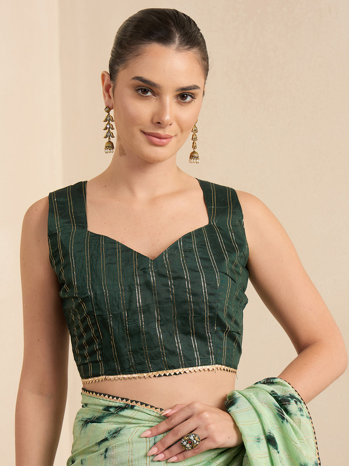 Unstitched green silk blend blouse piece with embellished design