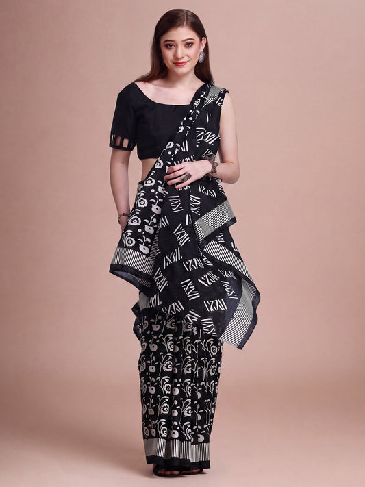 Woman wearing black bhagalpuri silk saree with hand block-printed motifs and black blouse