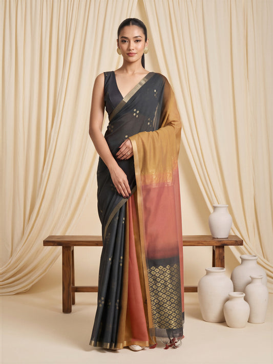 Woman wearing rust viscose silk saree with traditional indian motif work and black blouse
