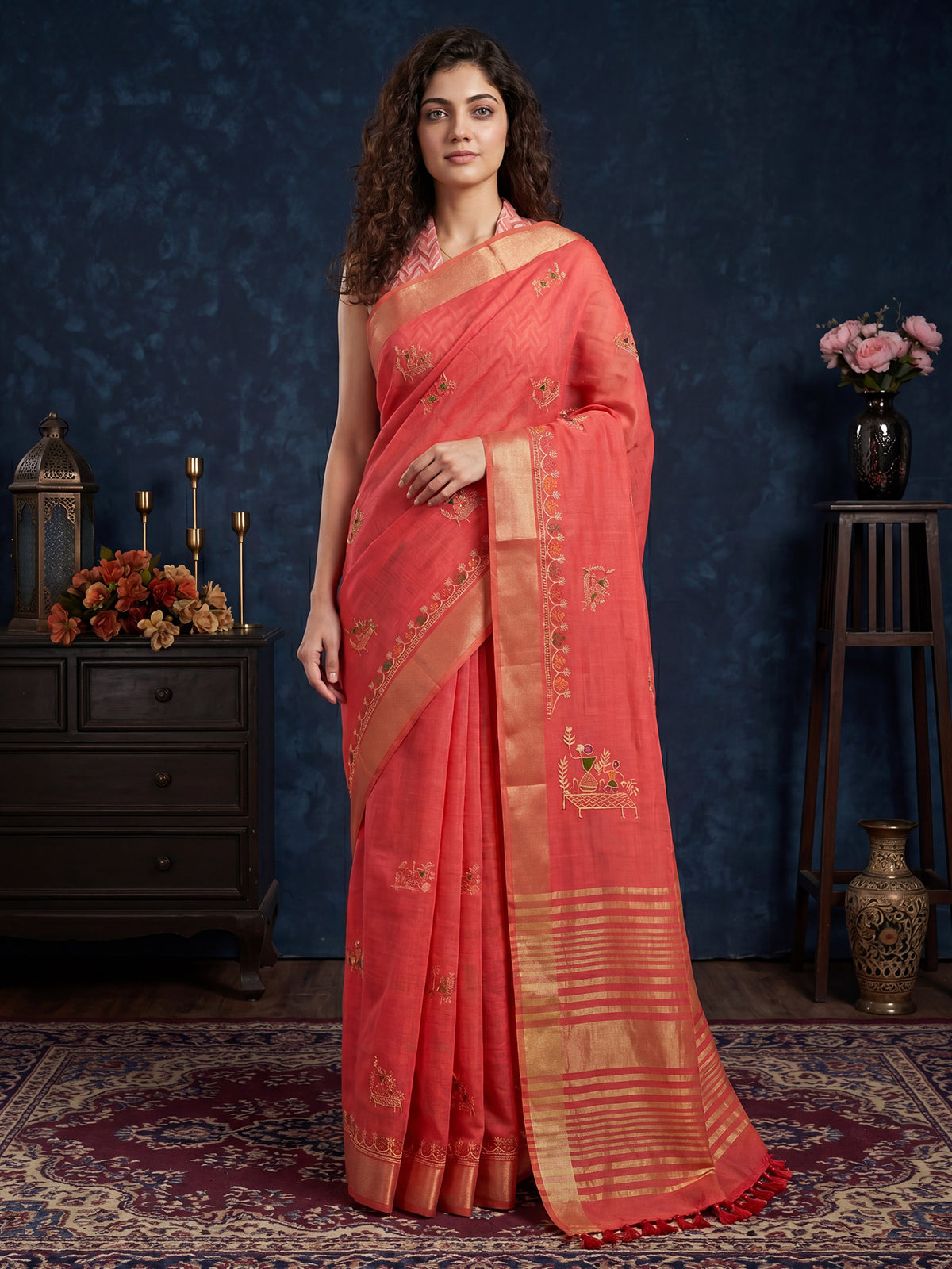 Woman wearing peach cotton linen saree with embroidered motif work and peach blouse