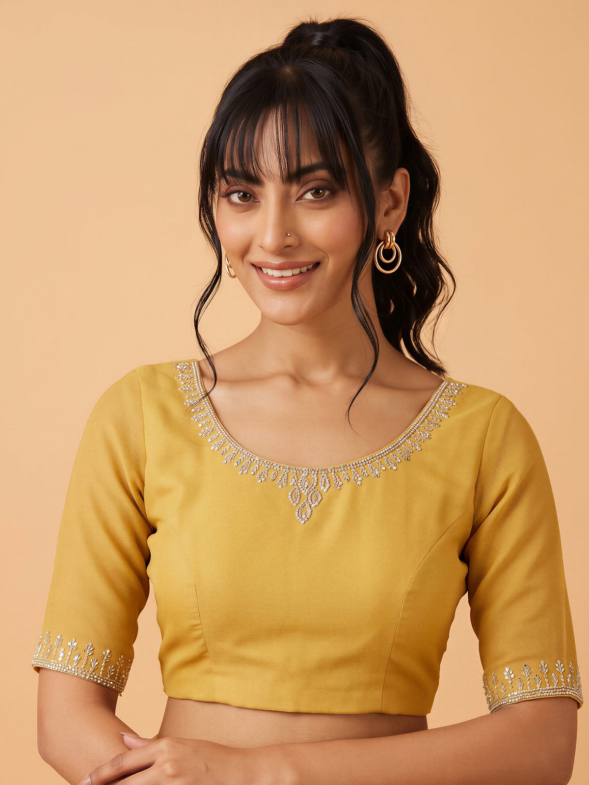 Unstitched yellow georgette blouse piece with embellished design